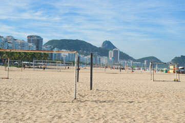 Rio de Janeiro, Brazil, May 19, 2025: Copacabana Beach is a beach located in the Copacabana neighborhood, in the South Zone of the city of Rio de Janeiro, Brazil. Beautiful blue skies and golden sand