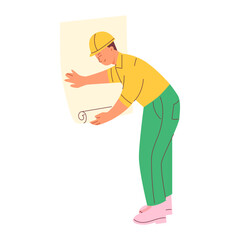 A male worker glues wallpaper. Repair concept