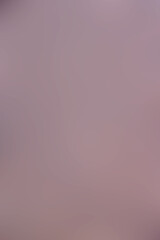 This image shows a closeup of a pink background with a blur