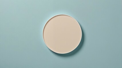 Beige round tray on light blue background