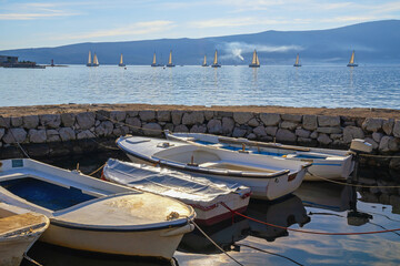 Beautiful autumn Mediterranean landscape. Fishing boats in small harbor. Montenegro, Bay of Kotor...