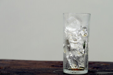 A glass full of ice, ready to be fizzy...but the soda is all gone!