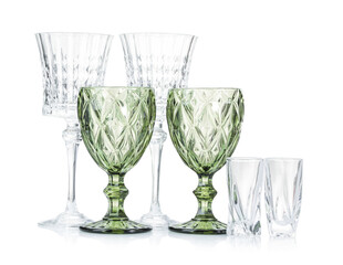 Different empty clean glasses isolated on white
