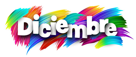 The Spanish word for December shown in bold over vibrant brush strokes