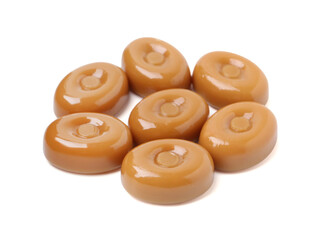Tasty hard toffee candies isolated on white