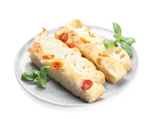 Pieces of delicious focaccia with tomatoes and basil isolated on white