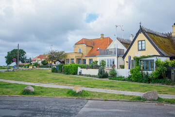 Street with tiny traditional houses in Dragor town in Denmark