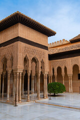 Decoration and carved facades of Court of the Lions of Alhambra Nasrid Palace, Granada, Spain....