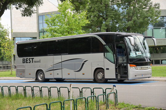 BELGRADE, SERBIA - May 14, 2025: Volanbusz logo on grey gray silver Setra bus. transportation and travel concept. New Setra S 416 HDH Bus at the International Motor Show for Commercial Vehicles