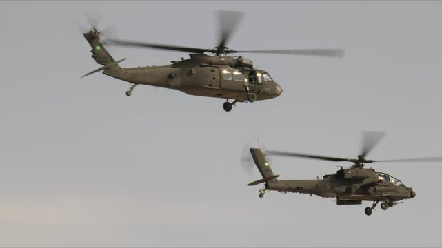 Saudi military helicopters in flight at National Aviation Show