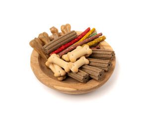 Assorted dog kibble, many canine food, different color dry pet food mix, various dog snack pile