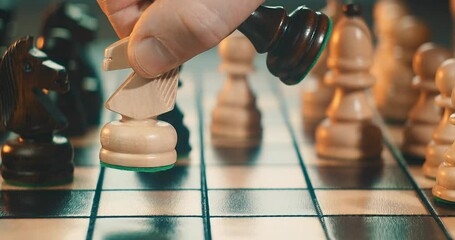 Close-Up of Chessboard and Hands Moving Pieces – Strategic Game Play. Strategic thinking, planning, competition concept. Intelligence, decision-making, mental focus. Themes of business, learning - Powered by Adobe