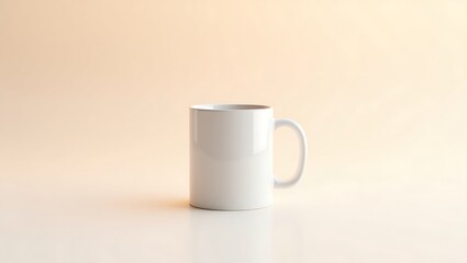 Obraz premium A simple white mug sitting on a cream colored surface in a minimalist and clean studio setting image