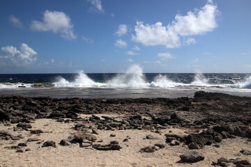 Atlantic ocean and water spray at the East coast of the Caribbean island Bonaire, Caribbean Netherlands