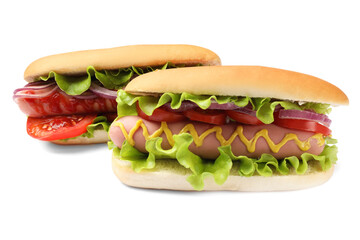 Tasty hot dogs with tomatoes, onions, lettuce and mustard on white background