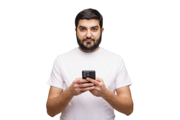 Man stands confidently while texting on his mobile device in a minimalistic setting, showcasing modern communication