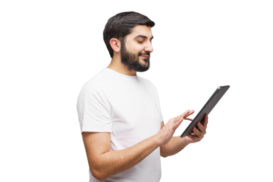 Engaging with technology, a man interacts with a tablet while immersed in a digital world