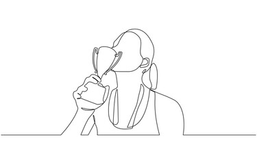 Continuous one line drawing female athlete wearing jersey kissing trophy after winning, Proud achievement. Dynamic one line draw graphic design vector illustration.