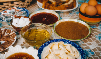 Traditional Moroccan breakfast with bread, olive oil, amlou, and argan oil
