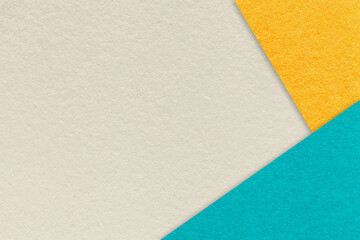 Abstract yellow, turquoise and beige paper background with copy space. Template for presentation, banner or card design