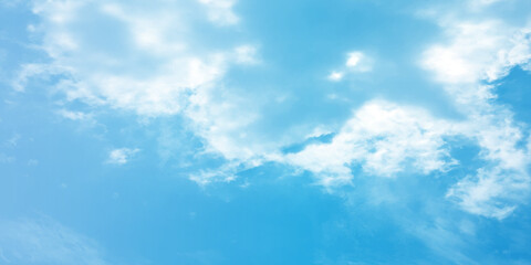 The blue sky and white clouds air indicate pure and fresh, bright weather canvas splashed with  store,m focusing on the clouds, a sunny day 