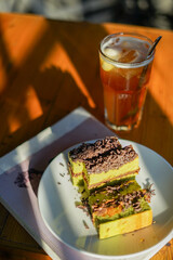 Matcha chocolate roll cake, Dessert made from green tea and chocolate blend with grated chocolate...
