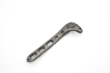 A Sleek titanium alloy Tibial Plateau Lateral surgical implant with multiple holes for fixation and stability