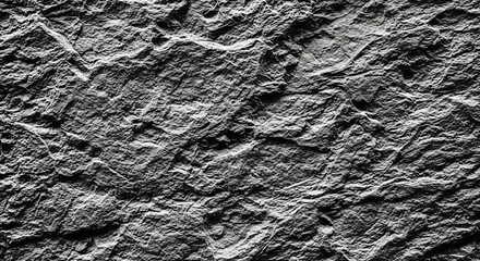 Black and white close-up of a rough rock wall texture, featuring a dark grunge background and empty space, Generative AI.