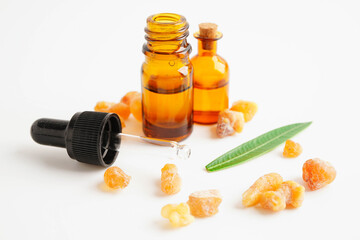 Frankincense or olibanum aromatic resin isolated on white background used in incense and perfumes.