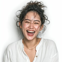 Joyful young asian girl laughing in white background portrait photography fun expression isolated scene