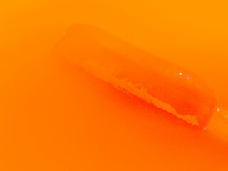 Orange popsicle ice cream in orange juice