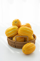 Yellow Oriental melon in a basket