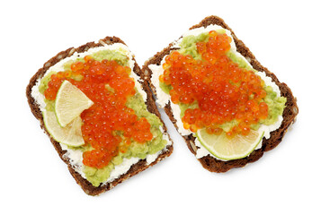 Delicious sandwiches with avocado, red caviar, cream cheese and lime isolated on white, top view