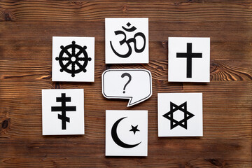 World religious symbols - Christianity cross, Islam crescent, Buddhism dharma wheel, Hinduism aum, Judaism David star top view