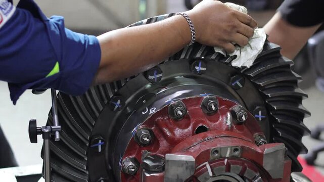 The process of measuring backlash on a differential involves using a dial indicator to measure the distance between the ring gear and pinion gear as they rotate.

