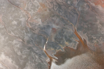 Aerial shot of oxidized iron minerals in water in old mining area, Río Tinto. Huelva Province, Spain