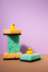 Household sponge foam cleaner creative still life and bath duck