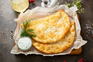 Cheese and meat homemade pastry cheburek top view