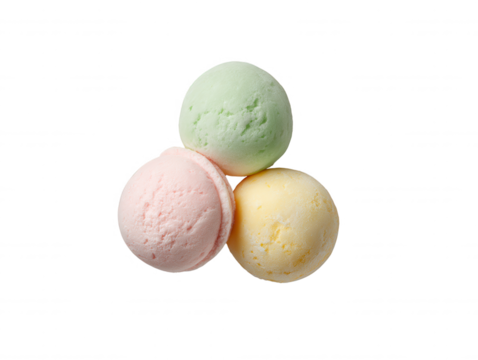 Three pastel colored bath bombs, in green pink and yellow, are arranged together against a simple white background for a clean spa and relaxation feeling.