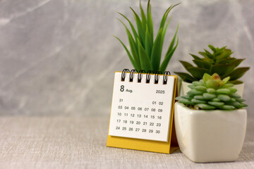 Hello August, August 2025 desk calendar for planning.