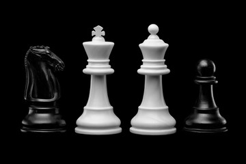 Chess pieces on black backdrop and strategy with white kings pawn and knight