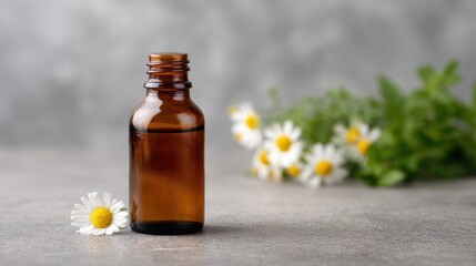 An elegant brown glass bottle with a daisy beside it, set against a soft gray background. Perfect for representing natural oils, beauty products, or herbal remedies.