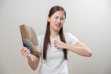 Suffering summer heat wave stroke, hot weather, tired asian young woman sweaty and thirsty,...