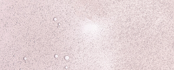 Textured background of cosmetic moisturizing gel or skin serum