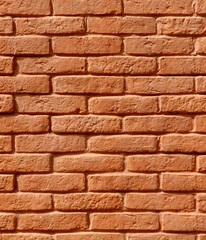 A brick wall with a brown color