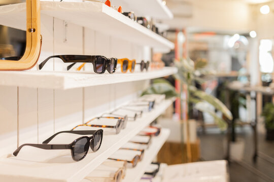 Sunglasses displayed in stylish retail shop setting