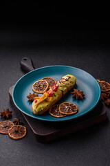 French food, dessert eclair with chocolate filling. Eclair as a background