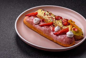 French food, dessert eclair with chocolate filling. Eclair as a background