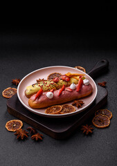 French food, dessert eclair with chocolate filling. Eclair as a background