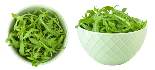 Heap of green fresh rucola or arugula leaf in ceramic bowl isolated on white background. Top view, flat lay